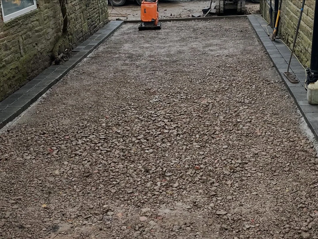 Stone sub-base compacted